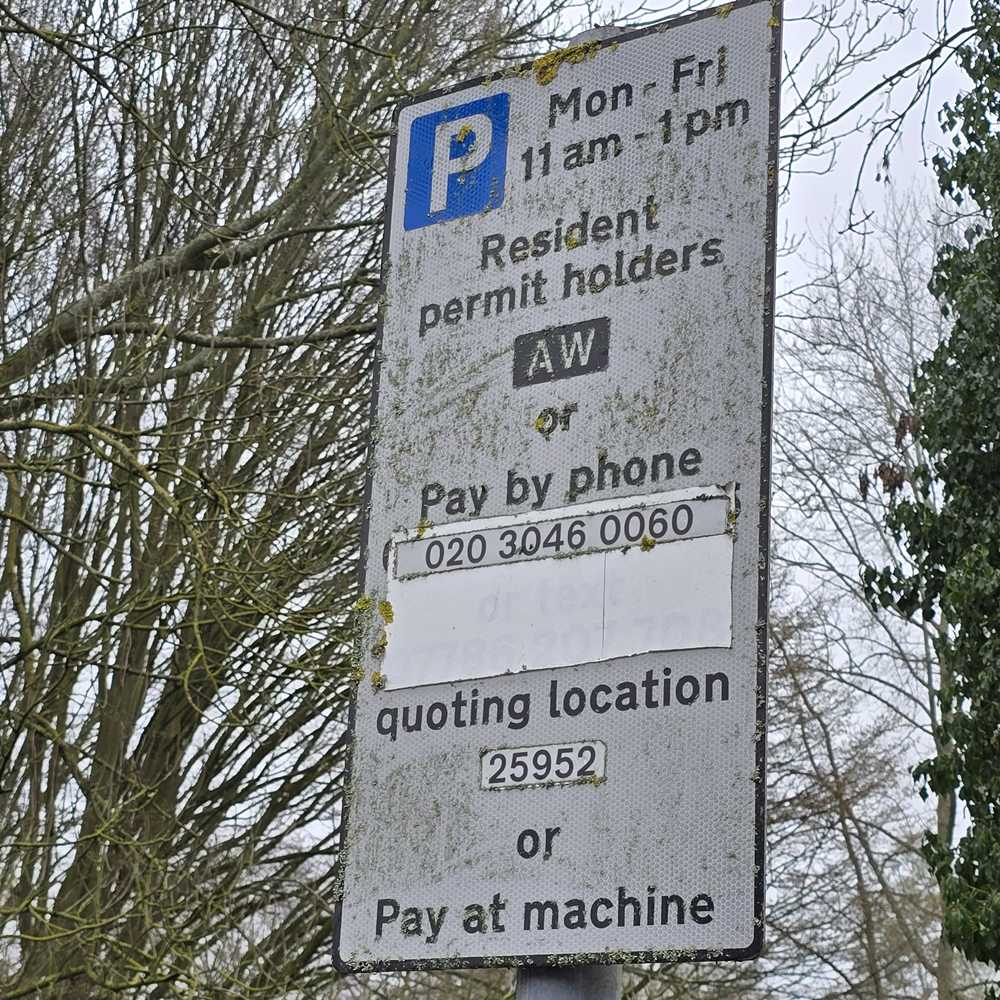 Parking signs on New Road