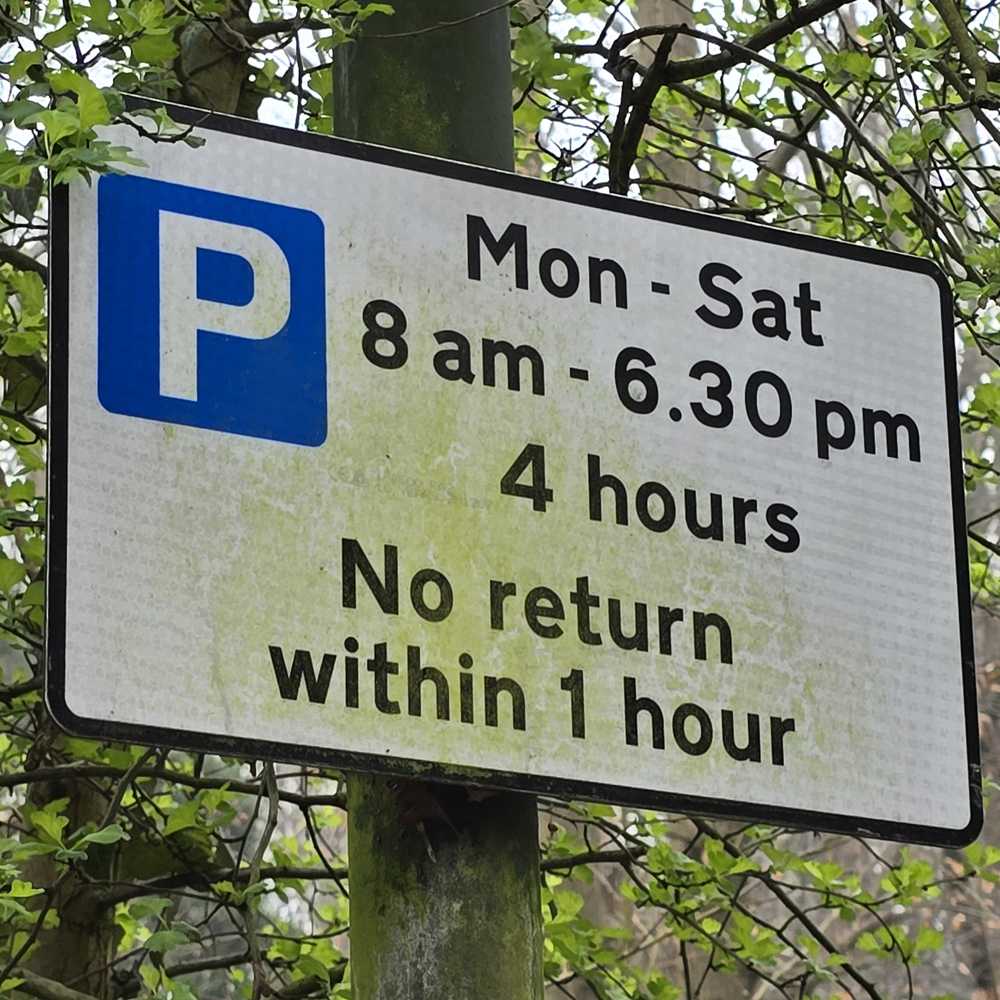 Parking signs on New Road
