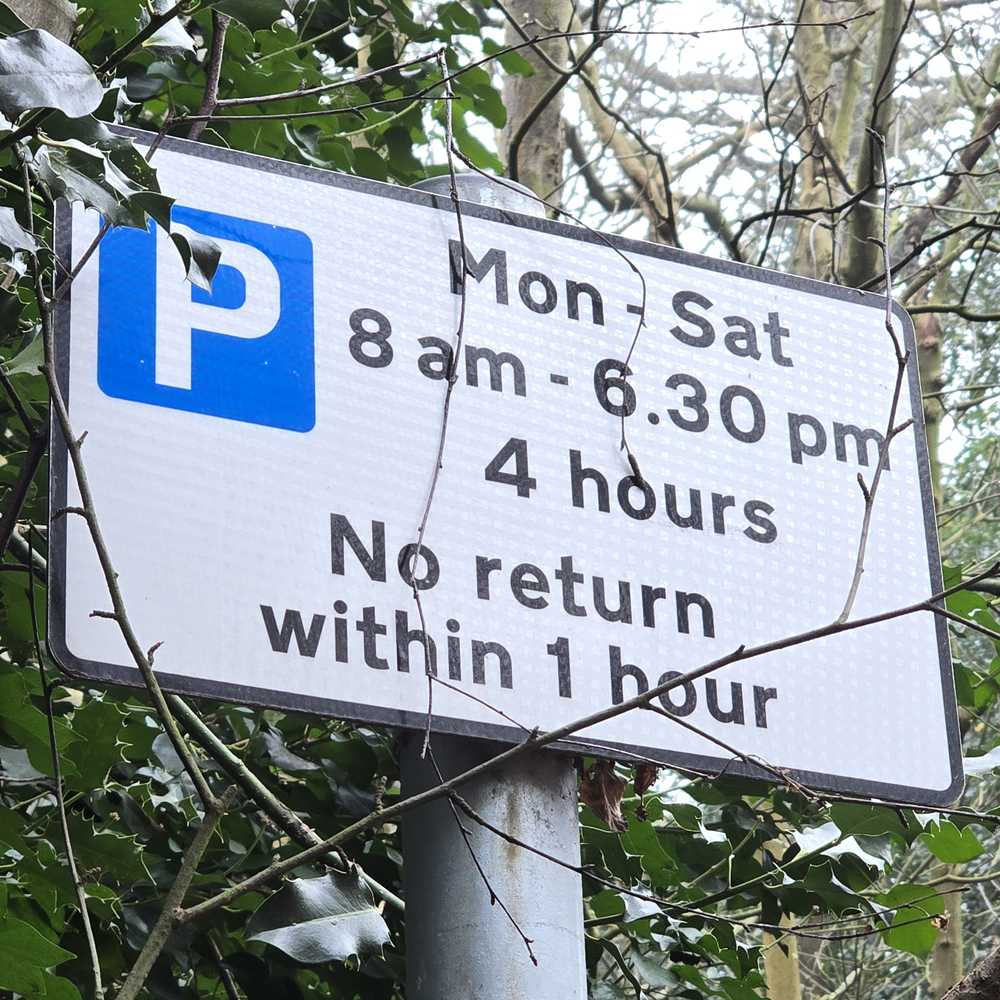 Parking signs on New Road