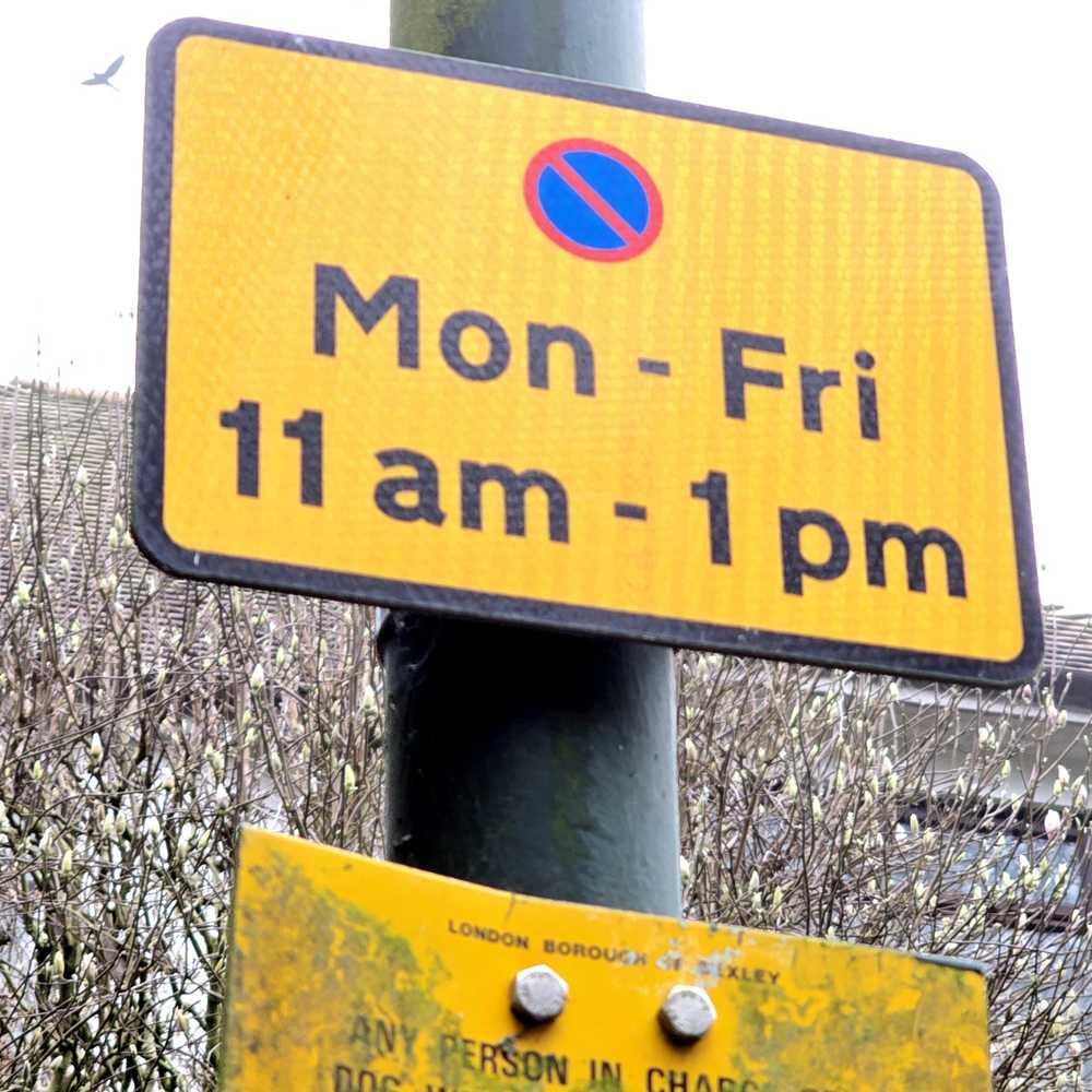 Parking signs on New Road