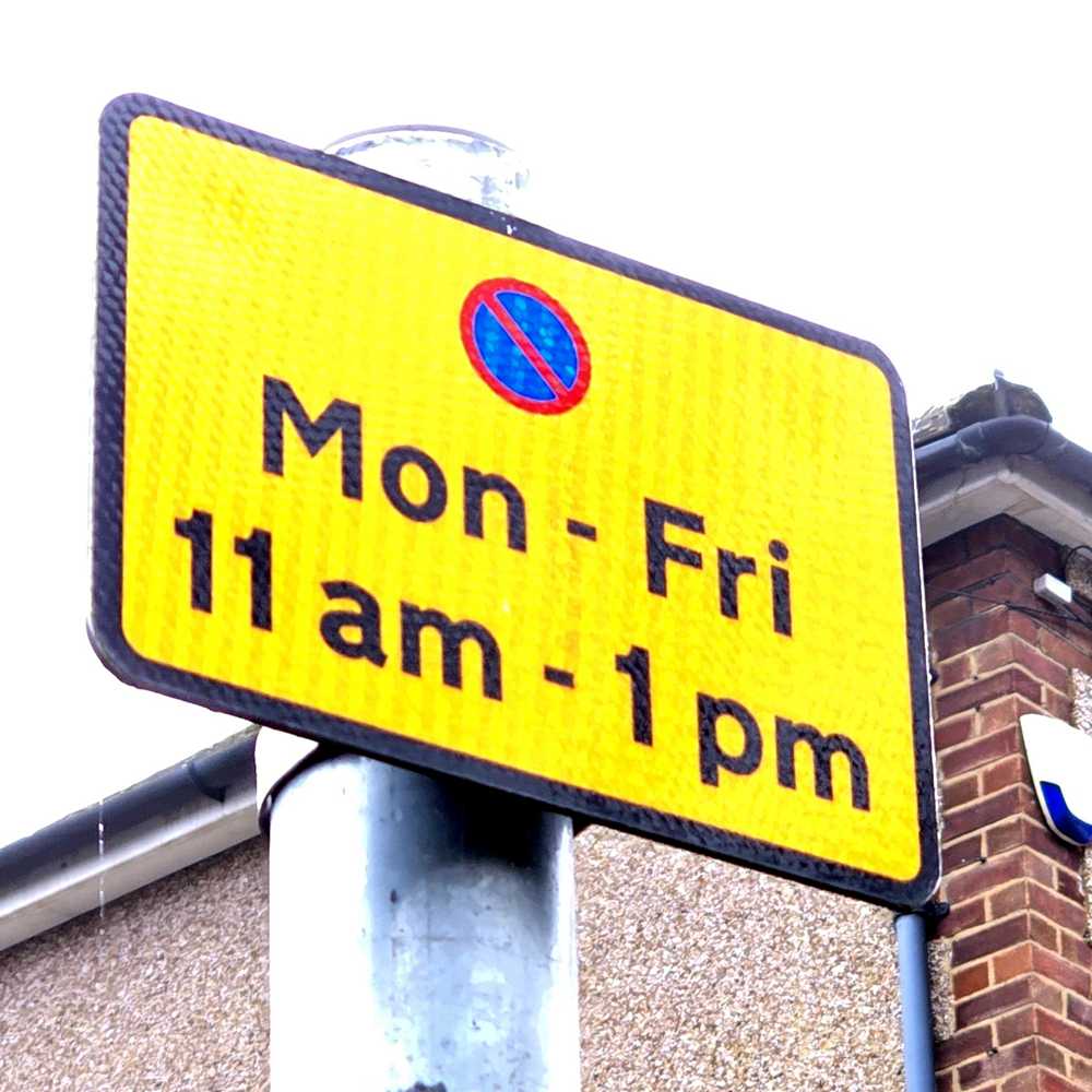 Parking signs on New Road