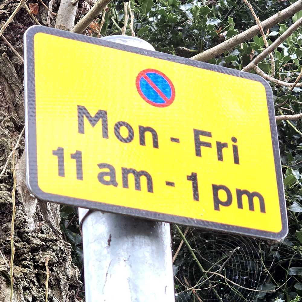Parking signs on New Road