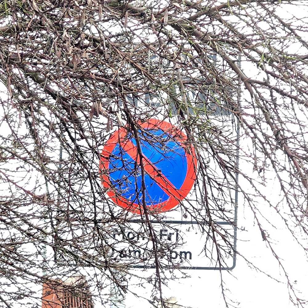 Parking signs on New Road